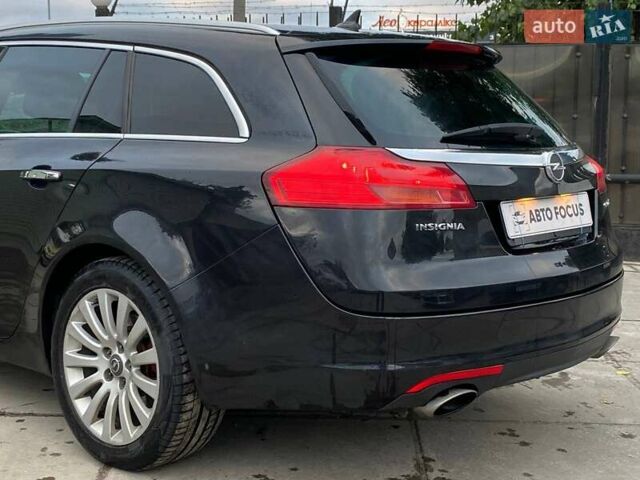 Черный Опель Инсигния, объемом двигателя 1.96 л и пробегом 304 тыс. км за 6990 $, фото 7 на Automoto.ua