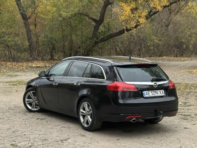 Черный Опель Инсигния, объемом двигателя 2 л и пробегом 275 тыс. км за 8500 $, фото 3 на Automoto.ua