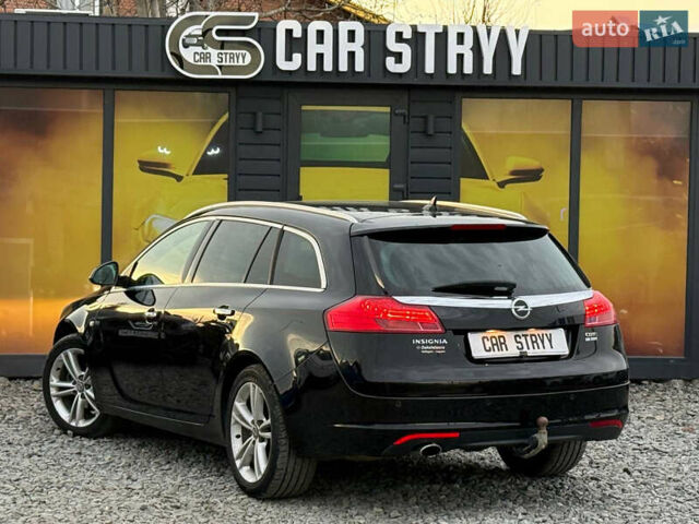 Черный Опель Инсигния, объемом двигателя 1.96 л и пробегом 242 тыс. км за 7600 $, фото 10 на Automoto.ua