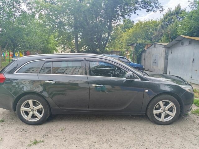 Чорний Опель Інсігнія, об'ємом двигуна 2 л та пробігом 236 тис. км за 7500 $, фото 1 на Automoto.ua