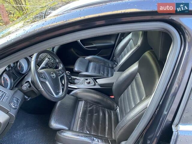 Черный Опель Инсигния, объемом двигателя 1.96 л и пробегом 208 тыс. км за 7750 $, фото 63 на Automoto.ua