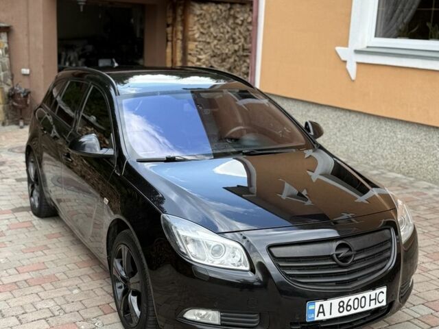 Чорний Опель Інсігнія, об'ємом двигуна 2 л та пробігом 308 тис. км за 6907 $, фото 1 на Automoto.ua