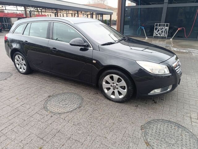 Чорний Опель Інсігнія, об'ємом двигуна 2 л та пробігом 175 тис. км за 6700 $, фото 2 на Automoto.ua