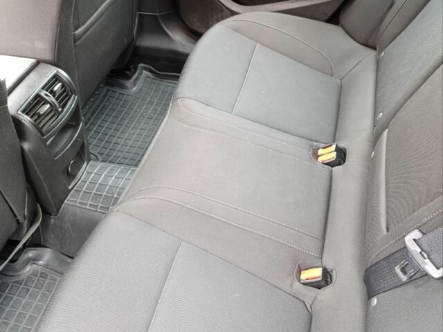 Чорний Опель Інсігнія, об'ємом двигуна 2 л та пробігом 175 тис. км за 6700 $, фото 7 на Automoto.ua