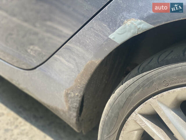 Черный Опель Инсигния, объемом двигателя 1.96 л и пробегом 270 тыс. км за 7500 $, фото 12 на Automoto.ua