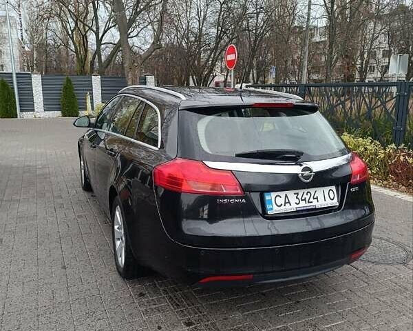 Черный Опель Инсигния, объемом двигателя 1.96 л и пробегом 177 тыс. км за 6500 $, фото 3 на Automoto.ua