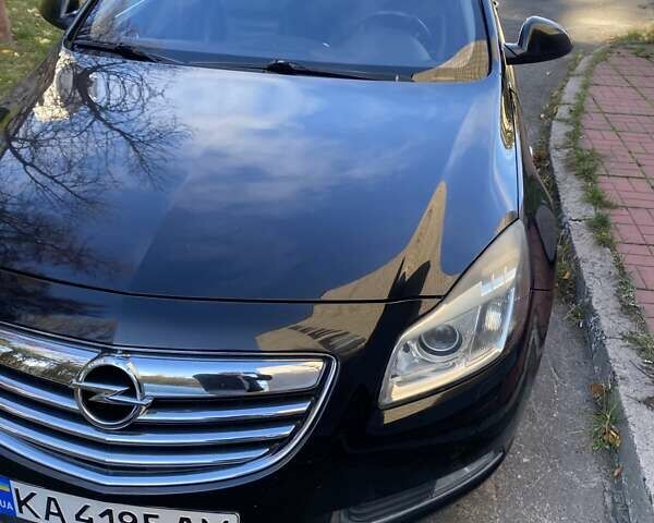 Черный Опель Инсигния, объемом двигателя 1.96 л и пробегом 208 тыс. км за 7750 $, фото 3 на Automoto.ua