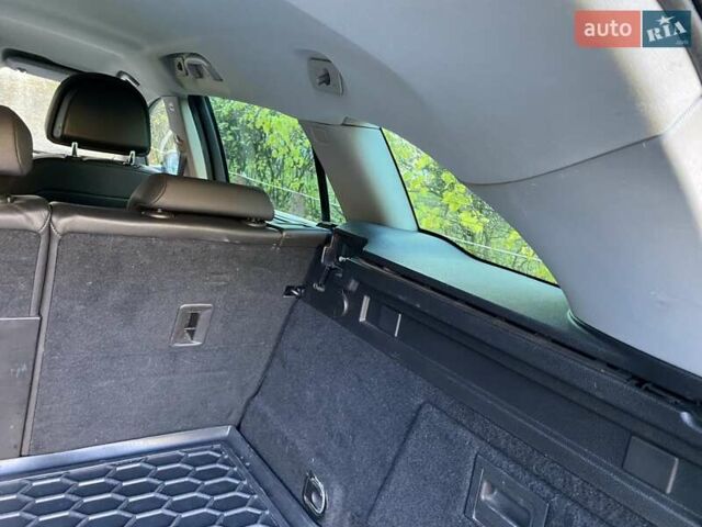 Черный Опель Инсигния, объемом двигателя 1.96 л и пробегом 208 тыс. км за 7750 $, фото 28 на Automoto.ua