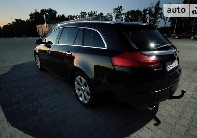 Черный Опель Инсигния, объемом двигателя 1.96 л и пробегом 253 тыс. км за 7400 $, фото 6 на Automoto.ua