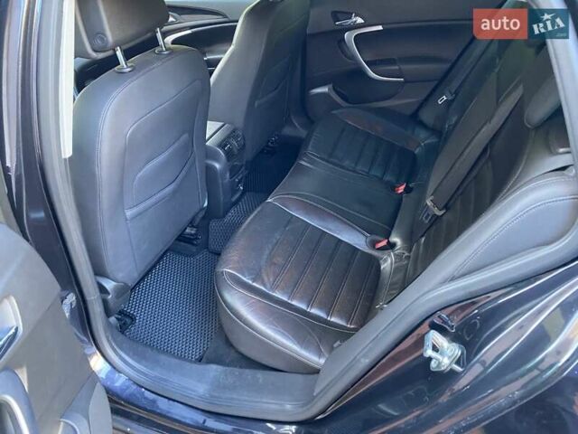 Черный Опель Инсигния, объемом двигателя 1.96 л и пробегом 208 тыс. км за 7750 $, фото 38 на Automoto.ua