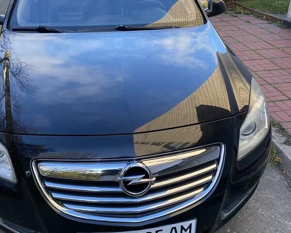 Черный Опель Инсигния, объемом двигателя 1.96 л и пробегом 208 тыс. км за 7750 $, фото 2 на Automoto.ua