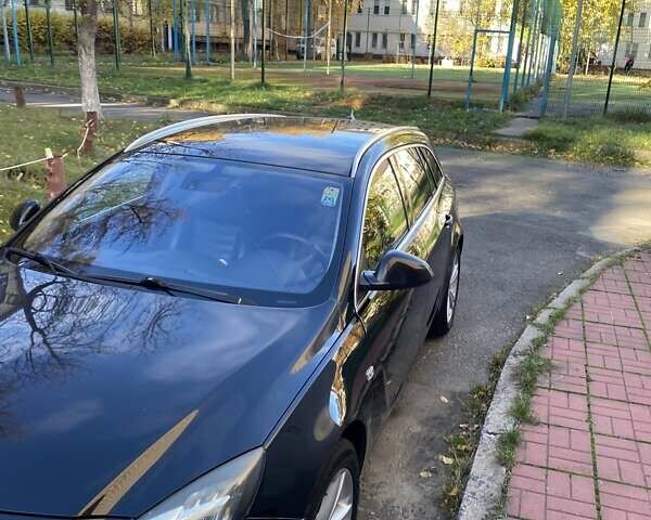 Черный Опель Инсигния, объемом двигателя 1.96 л и пробегом 208 тыс. км за 7750 $, фото 5 на Automoto.ua