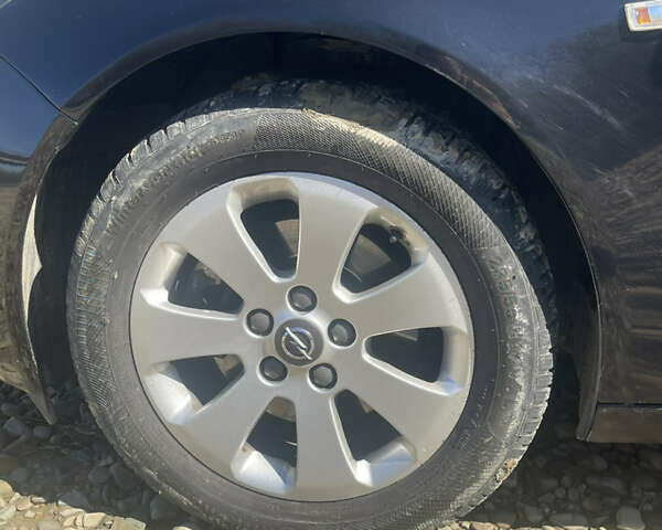 Черный Опель Инсигния, объемом двигателя 2 л и пробегом 197 тыс. км за 8500 $, фото 6 на Automoto.ua