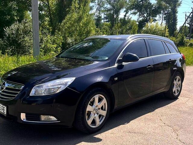 Черный Опель Инсигния, объемом двигателя 2 л и пробегом 259 тыс. км за 6200 $, фото 1 на Automoto.ua