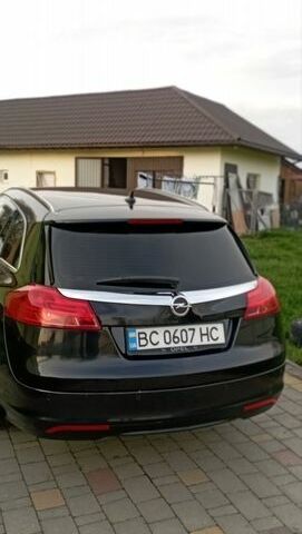 Чорний Опель Інсігнія, об'ємом двигуна 1.96 л та пробігом 250 тис. км за 6500 $, фото 1 на Automoto.ua