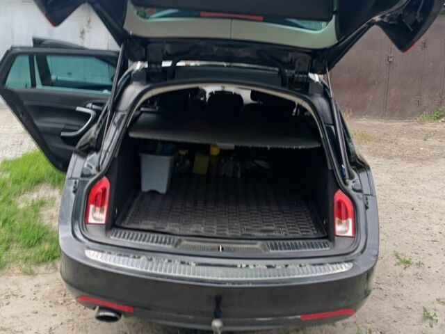 Чорний Опель Інсігнія, об'ємом двигуна 2 л та пробігом 236 тис. км за 7500 $, фото 2 на Automoto.ua