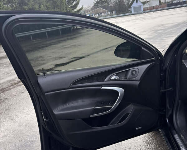 Черный Опель Инсигния, объемом двигателя 2 л и пробегом 265 тыс. км за 7250 $, фото 12 на Automoto.ua