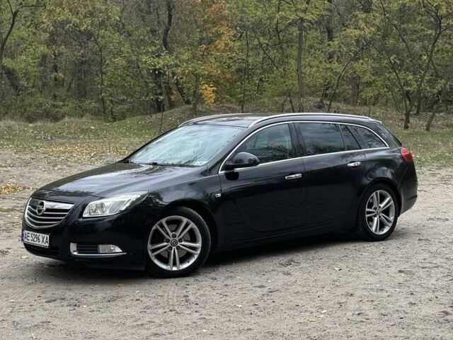 Черный Опель Инсигния, объемом двигателя 2 л и пробегом 275 тыс. км за 8500 $, фото 5 на Automoto.ua