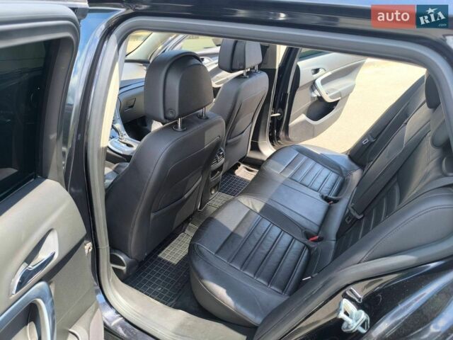 Черный Опель Инсигния, объемом двигателя 1.96 л и пробегом 250 тыс. км за 9000 $, фото 15 на Automoto.ua