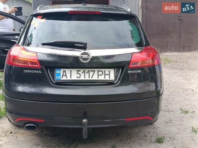 Черный Опель Инсигния, объемом двигателя 1.96 л и пробегом 236 тыс. км за 7500 $, фото 4 на Automoto.ua