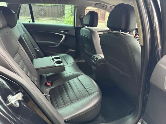 Черный Опель Инсигния, объемом двигателя 1.6 л и пробегом 204 тыс. км за 8300 $, фото 16 на Automoto.ua