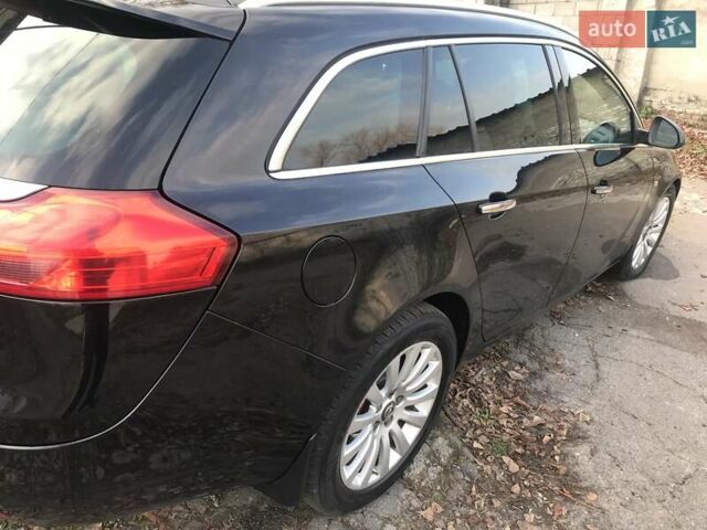 Черный Опель Инсигния, объемом двигателя 2.03 л и пробегом 200 тыс. км за 8200 $, фото 8 на Automoto.ua