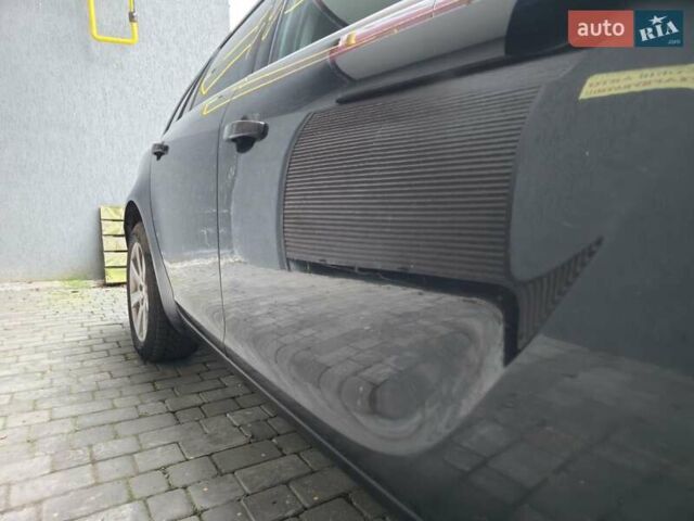 Чорний Опель Інсігнія, об'ємом двигуна 1.96 л та пробігом 412 тис. км за 6950 $, фото 3 на Automoto.ua