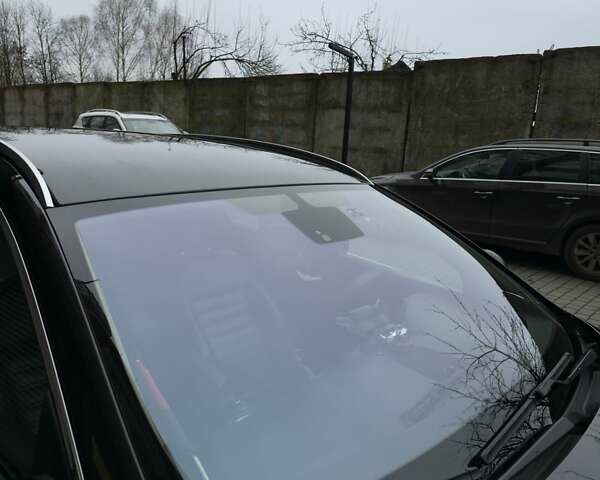 Чорний Опель Інсігнія, об'ємом двигуна 1.96 л та пробігом 412 тис. км за 6950 $, фото 2 на Automoto.ua