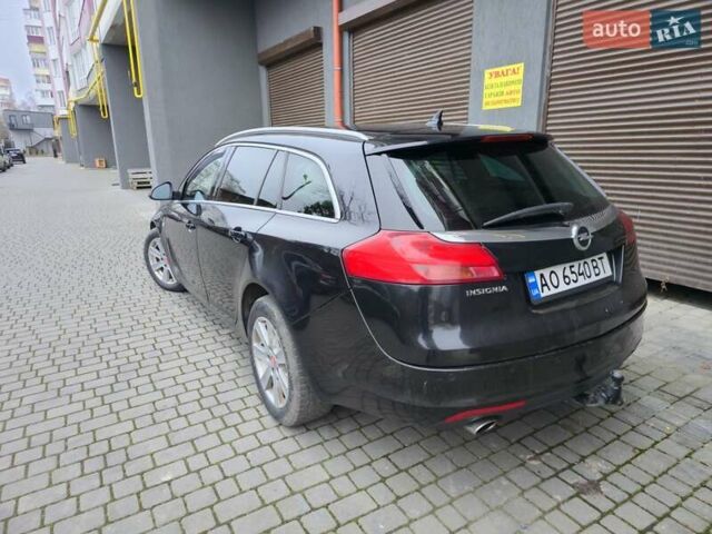 Чорний Опель Інсігнія, об'ємом двигуна 1.96 л та пробігом 412 тис. км за 6950 $, фото 4 на Automoto.ua