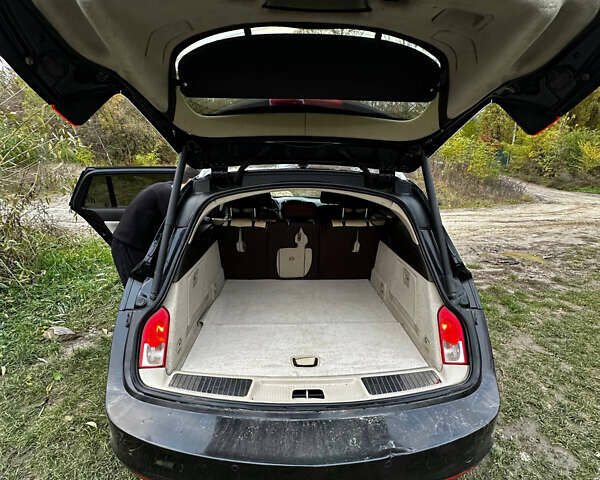 Черный Опель Инсигния, объемом двигателя 2 л и пробегом 266 тыс. км за 7600 $, фото 2 на Automoto.ua