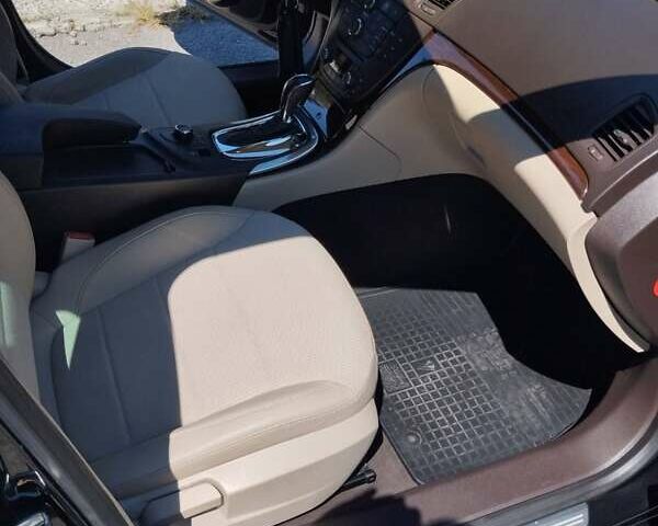 Черный Опель Инсигния, объемом двигателя 2 л и пробегом 211 тыс. км за 9900 $, фото 4 на Automoto.ua