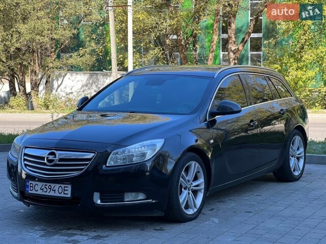 Чорний Опель Інсігнія, об'ємом двигуна 1.96 л та пробігом 370 тис. км за 5500 $, фото 9 на Automoto.ua