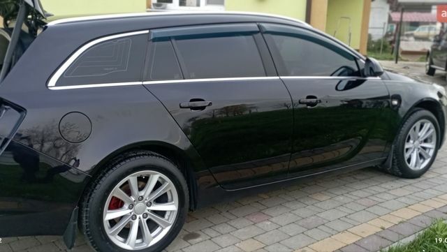 Чорний Опель Інсігнія, об'ємом двигуна 1.96 л та пробігом 250 тис. км за 6500 $, фото 6 на Automoto.ua