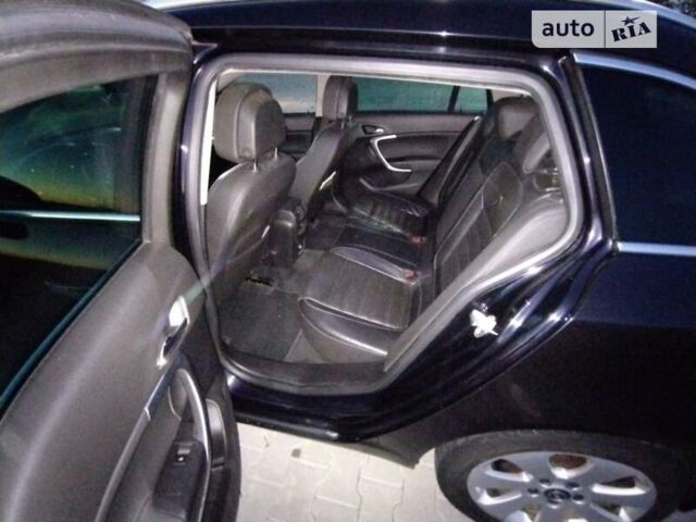 Черный Опель Инсигния, объемом двигателя 1.96 л и пробегом 253 тыс. км за 7400 $, фото 4 на Automoto.ua