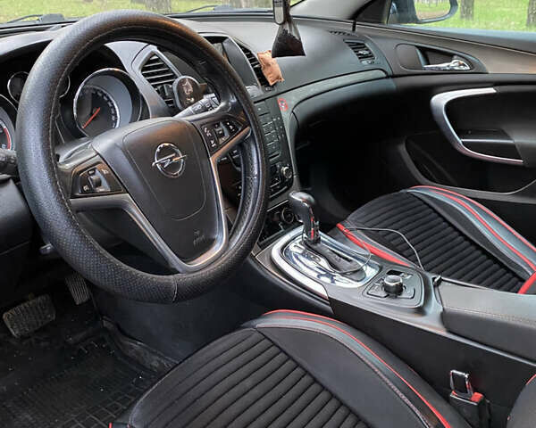 Чорний Опель Інсігнія, об'ємом двигуна 1.96 л та пробігом 357 тис. км за 6500 $, фото 5 на Automoto.ua