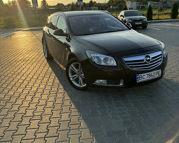 Черный Опель Инсигния, объемом двигателя 1.96 л и пробегом 250 тыс. км за 6700 $, фото 1 на Automoto.ua