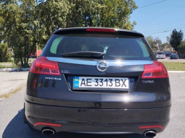 Чорний Опель Інсігнія, об'ємом двигуна 2 л та пробігом 211 тис. км за 9900 $, фото 6 на Automoto.ua