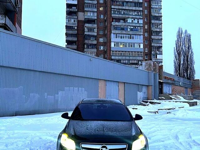 Черный Опель Инсигния, объемом двигателя 2 л и пробегом 199 тыс. км за 7500 $, фото 1 на Automoto.ua