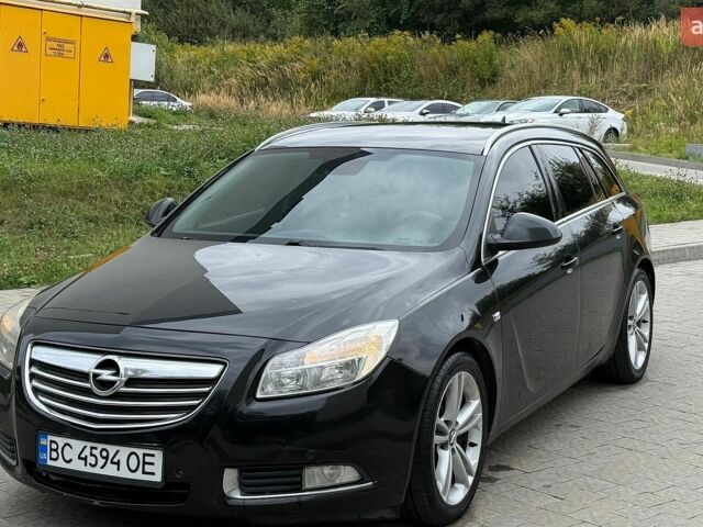 Черный Опель Инсигния, объемом двигателя 2 л и пробегом 370 тыс. км за 6300 $, фото 2 на Automoto.ua