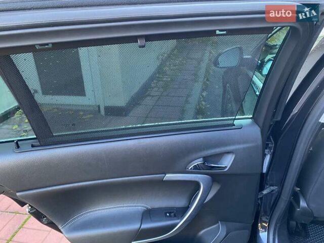 Черный Опель Инсигния, объемом двигателя 1.96 л и пробегом 208 тыс. км за 7750 $, фото 42 на Automoto.ua