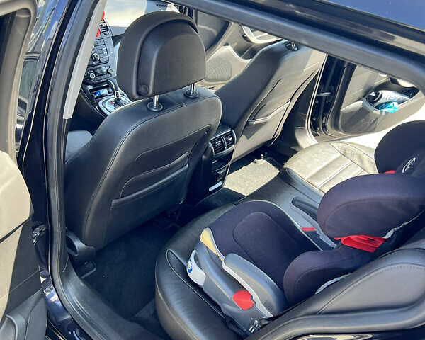 Черный Опель Инсигния, объемом двигателя 1.96 л и пробегом 200 тыс. км за 8700 $, фото 8 на Automoto.ua