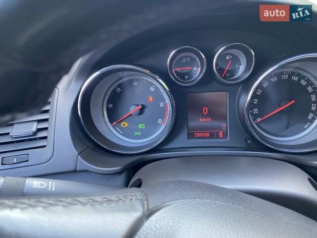 Черный Опель Инсигния, объемом двигателя 1.96 л и пробегом 208 тыс. км за 7750 $, фото 64 на Automoto.ua