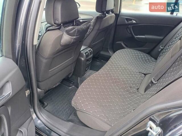 Чорний Опель Інсігнія, об'ємом двигуна 1.96 л та пробігом 179 тис. км за 6399 $, фото 12 на Automoto.ua