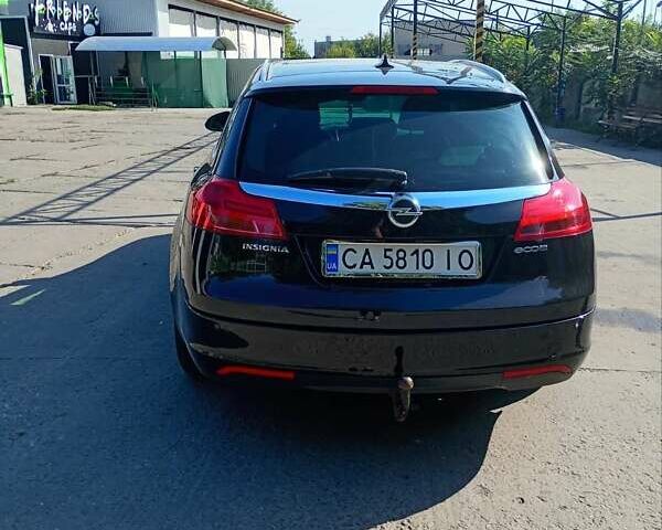 Черный Опель Инсигния, объемом двигателя 2 л и пробегом 322 тыс. км за 7500 $, фото 2 на Automoto.ua