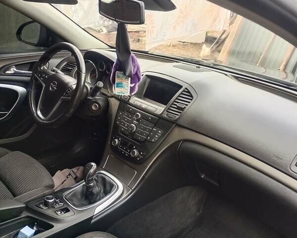 Черный Опель Инсигния, объемом двигателя 1.96 л и пробегом 206 тыс. км за 7200 $, фото 12 на Automoto.ua