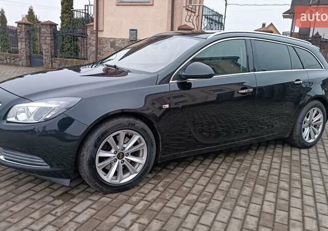 Черный Опель Инсигния, объемом двигателя 2 л и пробегом 215 тыс. км за 7250 $, фото 16 на Automoto.ua
