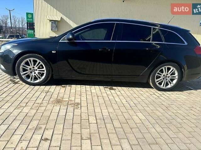 Чорний Опель Інсігнія, об'ємом двигуна 2 л та пробігом 296 тис. км за 7000 $, фото 1 на Automoto.ua