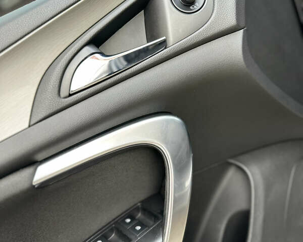 Черный Опель Инсигния, объемом двигателя 2 л и пробегом 194 тыс. км за 7500 $, фото 14 на Automoto.ua