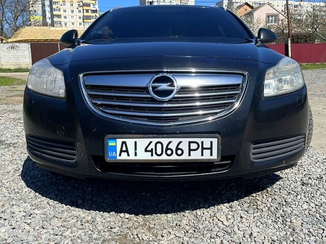 Черный Опель Инсигния, объемом двигателя 2 л и пробегом 280 тыс. км за 6500 $, фото 1 на Automoto.ua