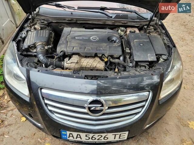 Черный Опель Инсигния, объемом двигателя 2 л и пробегом 337 тыс. км за 6600 $, фото 1 на Automoto.ua